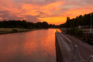 Zonsopkomst langs de Leie te Menen
