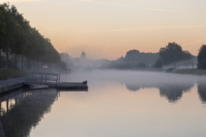 Zonsopkomst langs de Leie te Menen