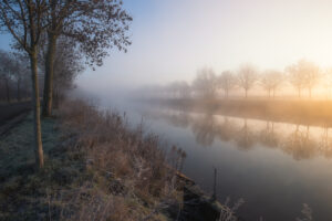 Zonsopkomst langs de Leie te Menen