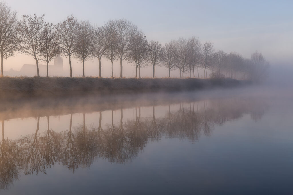 Zonsopkomst langs de Leie te Menen